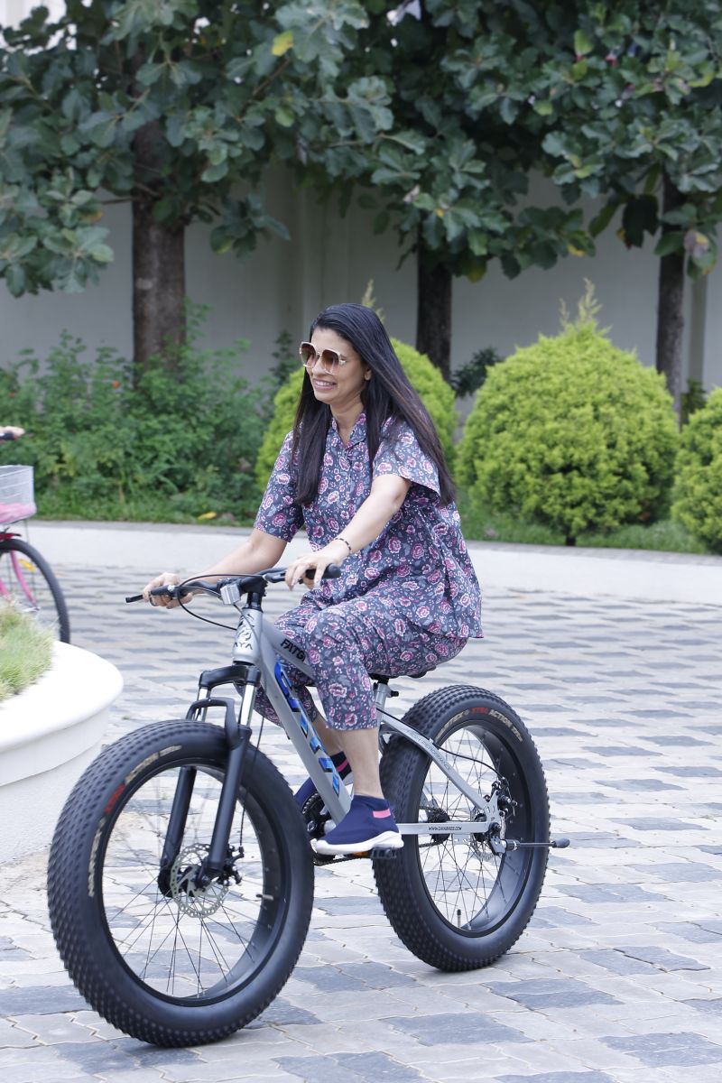 Not all heroes wear blazers. Some wear cotton pajama sets and ride bicycles.